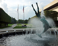 Click to enlarge photo of Girl With Dolphin by David Wynne.